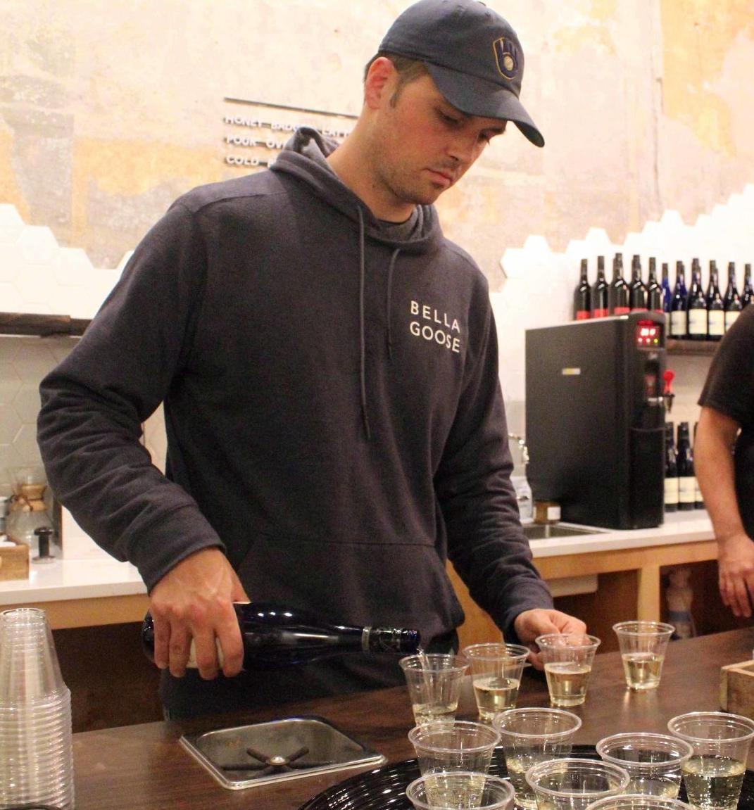 Jordan pours wine sample